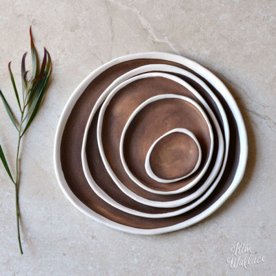 Nest of handmade plates by Kim Wallace